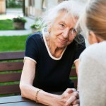 old lady talking to young lady