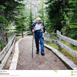 older man backpacking